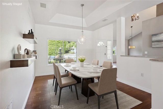 22501 Marilla St, Chatsworth, CA 91311 - dining space with dark wood-style floors and a raised ceiling