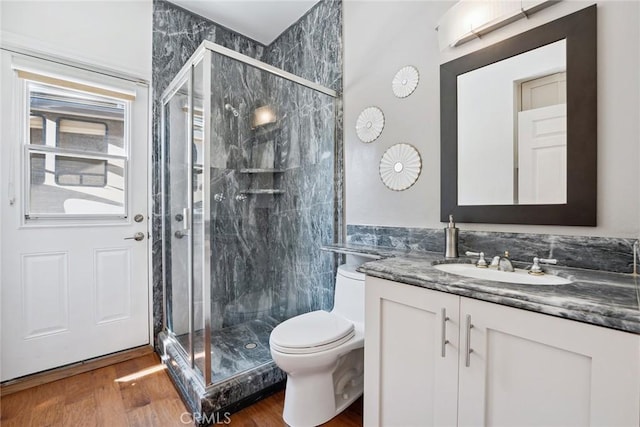 22501 Marilla St, Chatsworth, CA 91311 - full bath featuring vanity, wood finished floors, and a stall shower