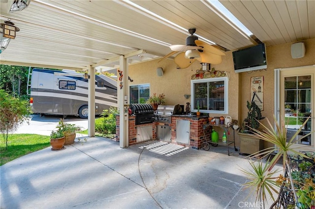 22501 Marilla St, Chatsworth, CA 91311 - view of patio with area for grilling, ceiling fan, and a carport