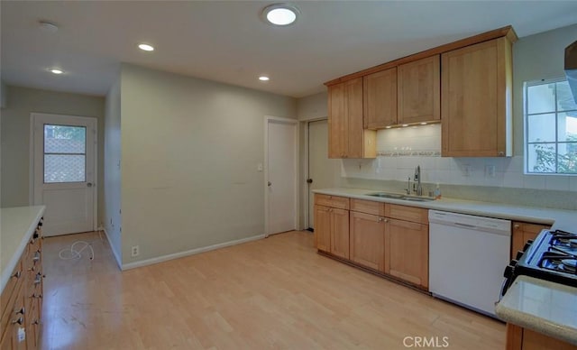 12911 Browning Ave, North Tustin, CA 92705 - kitchen with white dishwasher, light wood-type flooring, light countertops, decorative backsplash, and recessed lighting