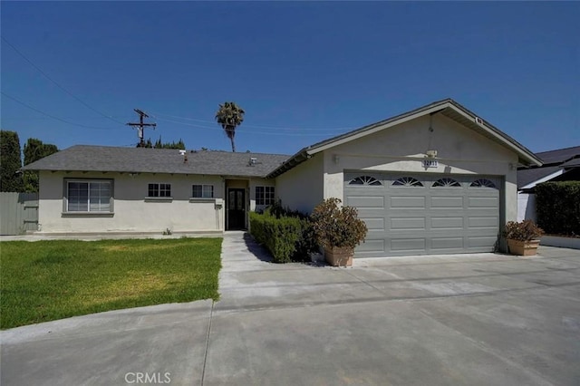 12911 Browning Ave, North Tustin, CA 92705 - ranch-style home featuring stucco siding, driveway, an attached garage, and a front yard
