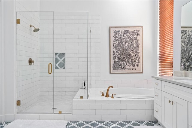 56610 Muirfield Ln, Quinta, CA 92253 - full bath with a bath, vanity, and a stall shower