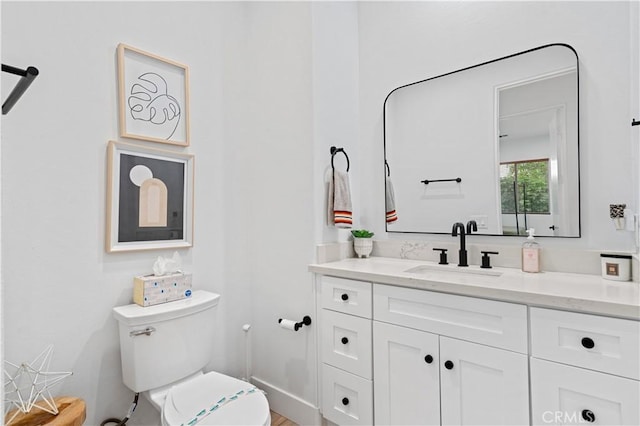 56610 Muirfield Ln, Quinta, CA 92253 - half bath featuring toilet and vanity