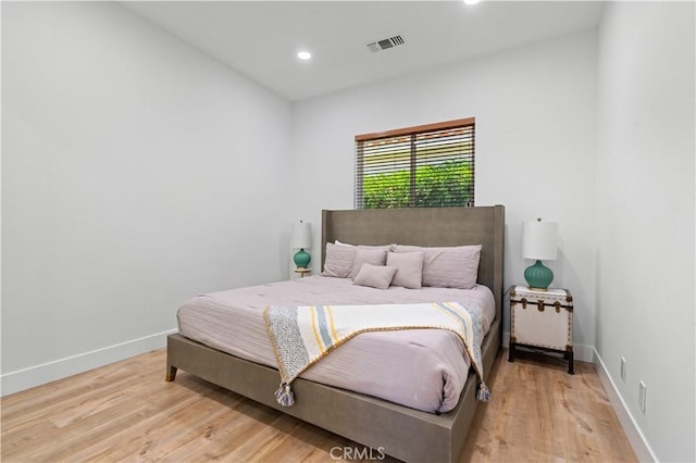 56610 Muirfield Ln, Quinta, CA 92253 - bedroom with light wood-type flooring and recessed lighting