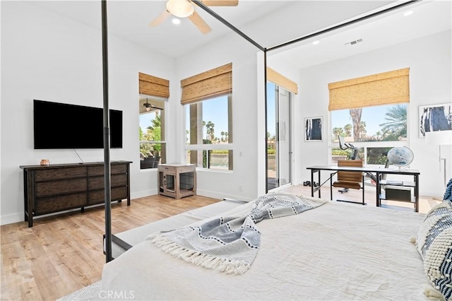 56610 Muirfield Ln, Quinta, CA 92253 - bedroom with wood finished floors, access to outside, ceiling fan, and recessed lighting