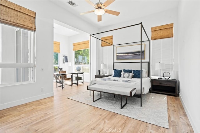 56610 Muirfield Ln, Quinta, CA 92253 - bedroom with wood finished floors and a ceiling fan