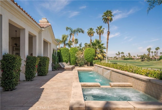 56610 Muirfield Ln, Quinta, CA 92253 - view of swimming pool featuring a patio area, golf course view, and a pool with connected hot tub