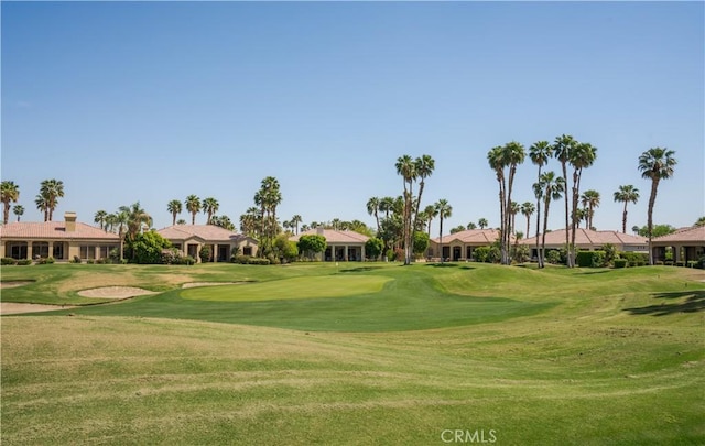 56610 Muirfield Ln, Quinta, CA 92253 - view of community featuring a yard, golf course view, and a residential view
