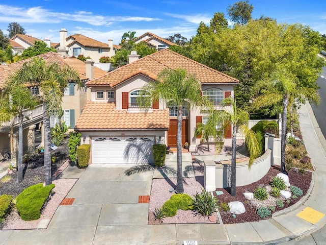 18103 Smokesignal Dr, San Diego, CA 92127 - mediterranean / spanish home with a tiled roof, stucco siding, driveway, and an attached garage