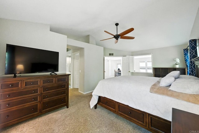 18103 Smokesignal Dr, San Diego, CA 92127 - bedroom featuring light colored carpet, vaulted ceiling, and a ceiling fan