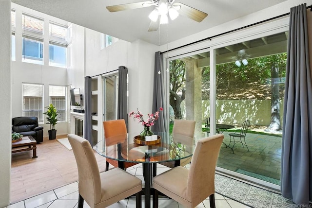 18103 Smokesignal Dr, San Diego, CA 92127 - dining area featuring a ceiling fan, healthy amount of natural light, and light tile patterned floors