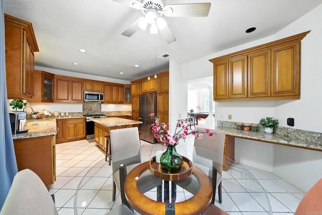 18103 Smokesignal Dr, San Diego, CA 92127 - dining area featuring ceiling fan, light tile patterned flooring, and recessed lighting