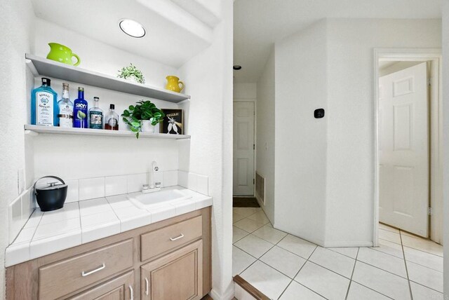 18103 Smokesignal Dr, San Diego, CA 92127 - bathroom featuring tile patterned floors and vanity