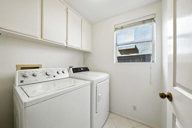 18103 Smokesignal Dr, San Diego, CA 92127 - washroom with washing machine and dryer, cabinet space, and light tile patterned floors