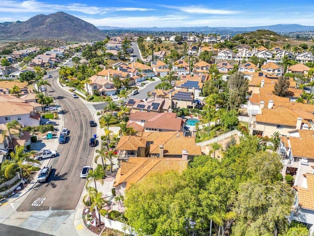 18103 Smokesignal Dr, San Diego, CA 92127 - aerial perspective of suburban area with a mountainous background