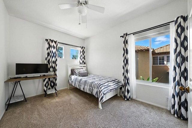 18103 Smokesignal Dr, San Diego, CA 92127 - carpeted bedroom with baseboards and a ceiling fan