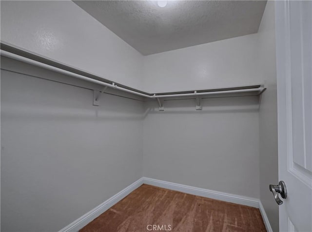 22182 Platino, Mission Viejo, CA 92691 - spacious closet featuring carpet floors