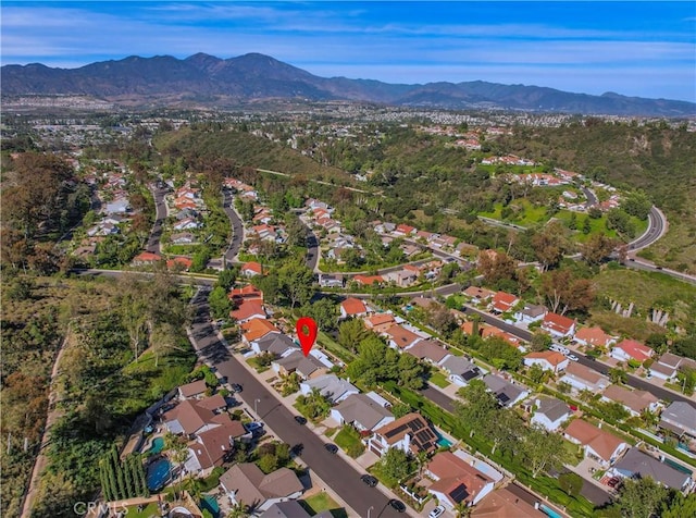 22182 Platino, Mission Viejo, CA 92691 - aerial view of property's location featuring a mountainous background and nearby suburban area