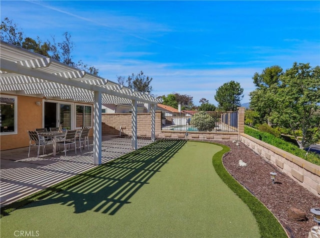 22182 Platino, Mission Viejo, CA 92691 - view of yard with a pergola, an area to practice putting, and a patio area