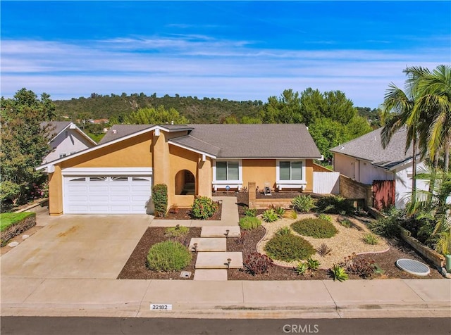22182 Platino, Mission Viejo, CA 92691 - single story home with stucco siding, an attached garage, and driveway