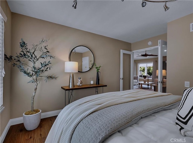 22182 Platino, Mission Viejo, CA 92691 - bedroom featuring french doors and wood finished floors