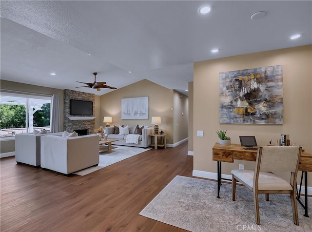 22182 Platino, Mission Viejo, CA 92691 - living room featuring ceiling fan, wood finished floors, a fireplace, an office area, and recessed lighting