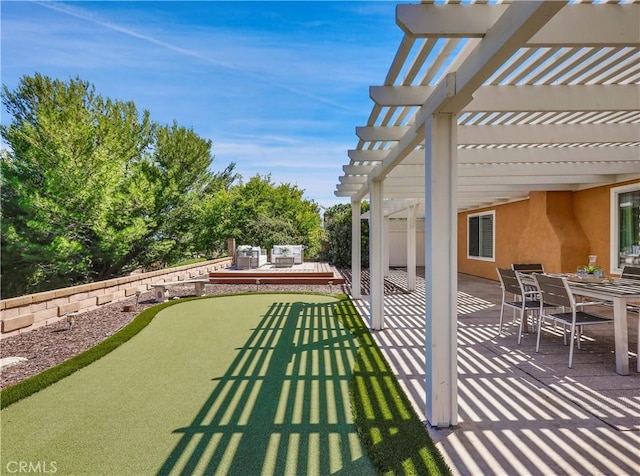 22182 Platino, Mission Viejo, CA 92691 - view of patio featuring a pergola, a putting green, and outdoor dining space