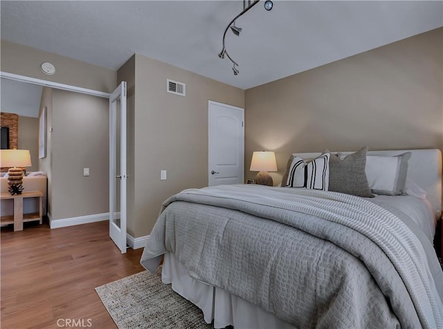 22182 Platino, Mission Viejo, CA 92691 - bedroom with wood finished floors and baseboards