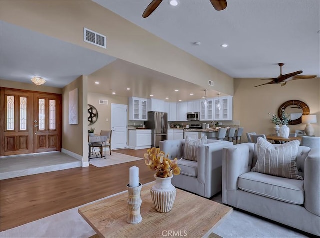 22182 Platino, Mission Viejo, CA 92691 - living room with ceiling fan, light wood-style flooring, and recessed lighting
