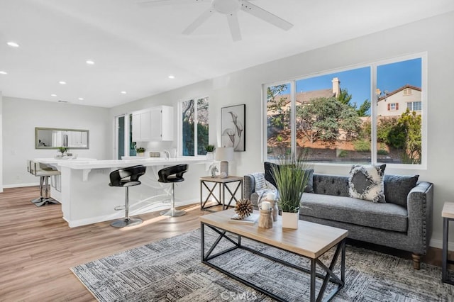 24186 Matthew Pl, Newhall, CA 91321 - living room featuring light wood-type flooring, recessed lighting, and ceiling fan