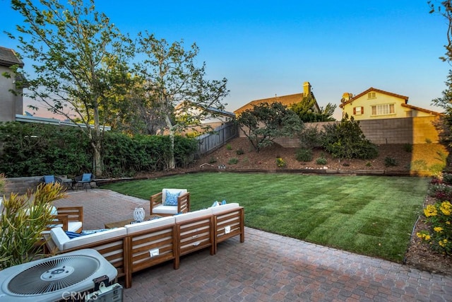 24186 Matthew Pl, Newhall, CA 91321 - fenced backyard featuring a patio area and an outdoor hangout area