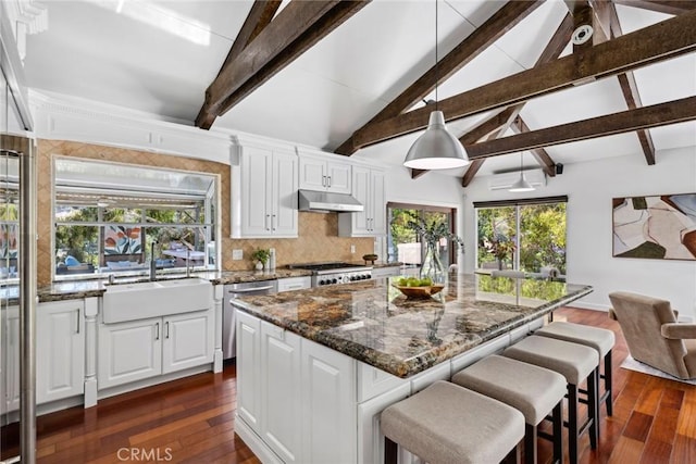 10255 Overhill Dr, Santa Ana, CA 92705 - kitchen with stainless steel dishwasher, dark wood-style flooring, and white cabinets
