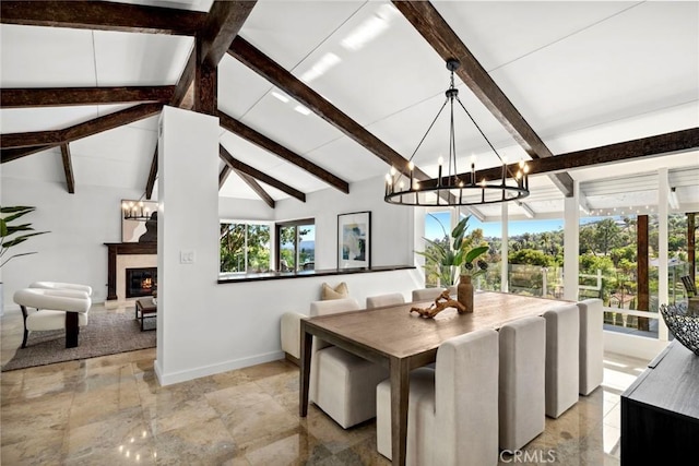 10255 Overhill Dr, Santa Ana, CA 92705 - dining room featuring a chandelier and a glass covered fireplace