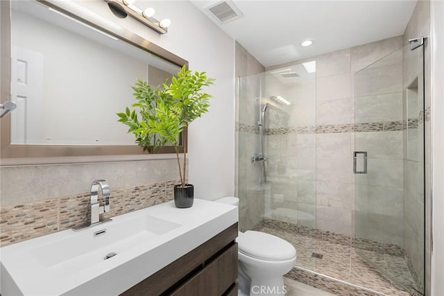 10255 Overhill Dr, Santa Ana, CA 92705 - full bathroom featuring vanity, a stall shower, tasteful backsplash, and recessed lighting
