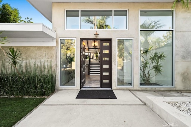 10255 Overhill Dr, Santa Ana, CA 92705 - doorway to property with stucco siding