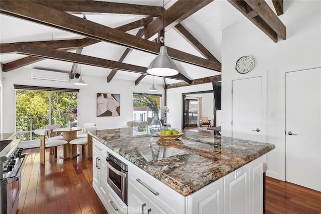 10255 Overhill Dr, Santa Ana, CA 92705 - kitchen with stainless steel appliances, healthy amount of natural light, white cabinetry, and dark wood-type flooring