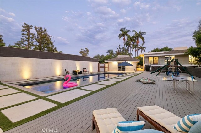 10255 Overhill Dr, Santa Ana, CA 92705 - wooden deck with a patio area and an outbuilding