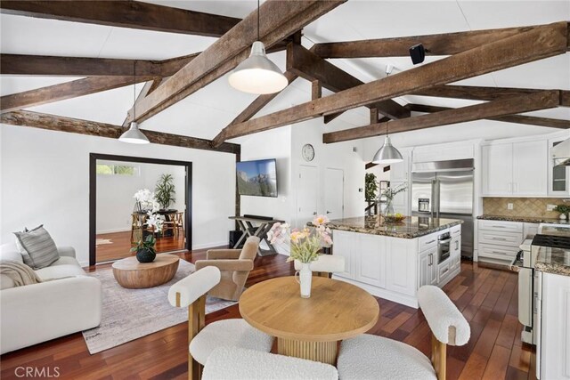 10255 Overhill Dr, Santa Ana, CA 92705 - dining area featuring dark wood finished floors and baseboards