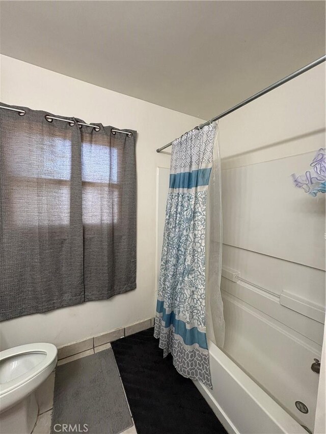 927 E Murphy, Blythe, CA 92225 - bathroom featuring shower / bathtub combination with curtain and toilet