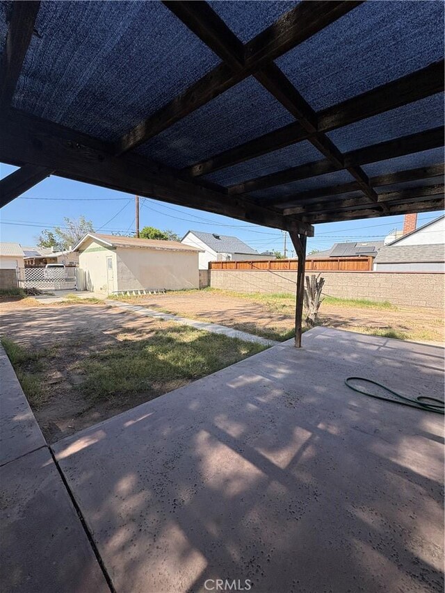 927 E Murphy, Blythe, CA 92225 - view of patio / terrace with an outbuilding