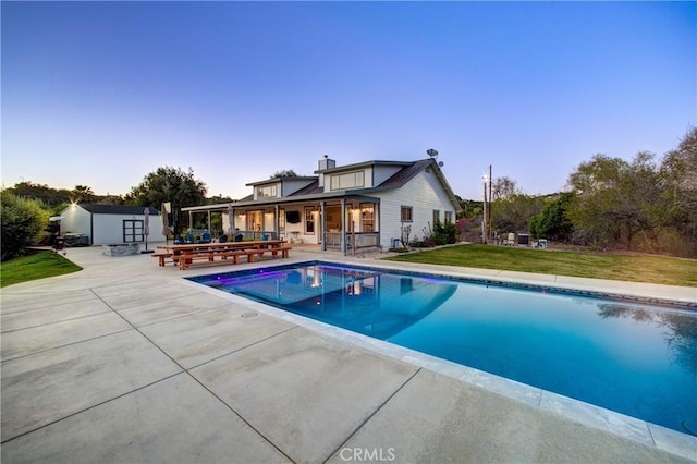 2166 Lopez Dr, Arroyo Grande, CA 93420 - outdoor pool with a storage unit, a yard, and a patio area