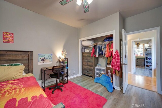 2166 Lopez Dr, Arroyo Grande, CA 93420 - bedroom featuring wood finished floors, a closet, and a ceiling fan