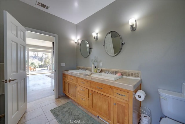 2166 Lopez Dr, Arroyo Grande, CA 93420 - full bath with double vanity and tile patterned flooring