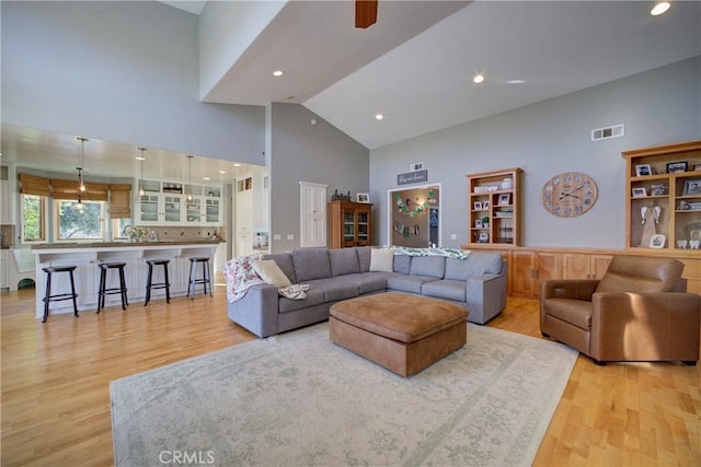 2166 Lopez Dr, Arroyo Grande, CA 93420 - living area with high vaulted ceiling, light wood finished floors, and recessed lighting