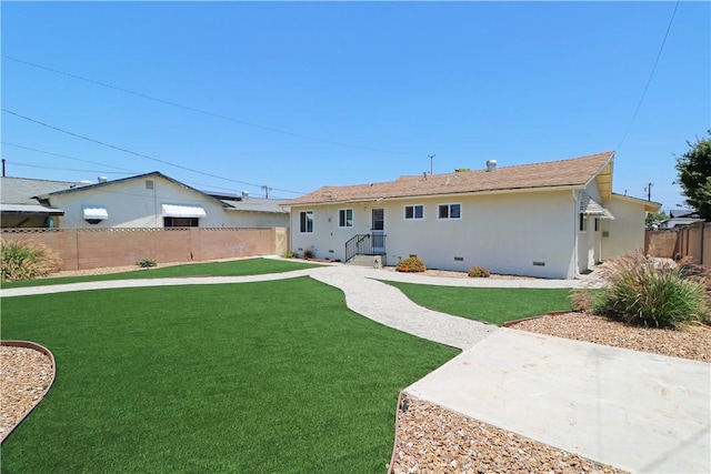 1116 N Center St, Orange, CA 92867 - rear view of property with a fenced backyard, crawl space, and a patio area