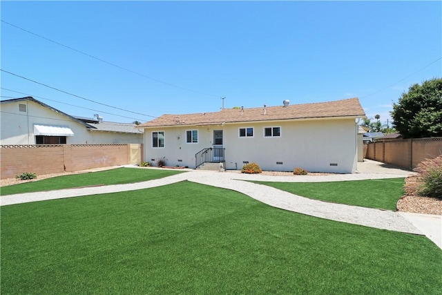 1116 N Center St, Orange, CA 92867 - rear view of property with crawl space and stucco siding