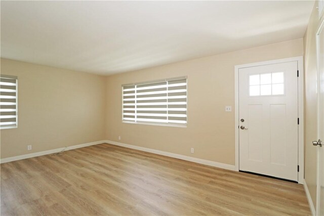 1116 N Center St, Orange, CA 92867 - foyer entrance with light wood-style floors