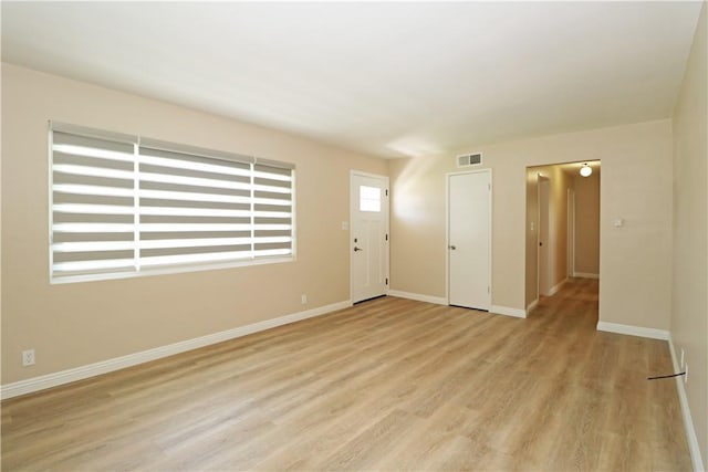 1116 N Center St, Orange, CA 92867 - empty room featuring light wood finished floors and baseboards
