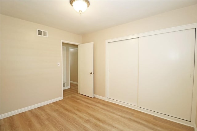 1116 N Center St, Orange, CA 92867 - unfurnished bedroom featuring light wood finished floors and a closet