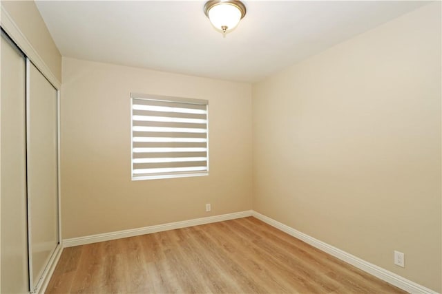 1116 N Center St, Orange, CA 92867 - unfurnished bedroom with a closet and light wood-style flooring